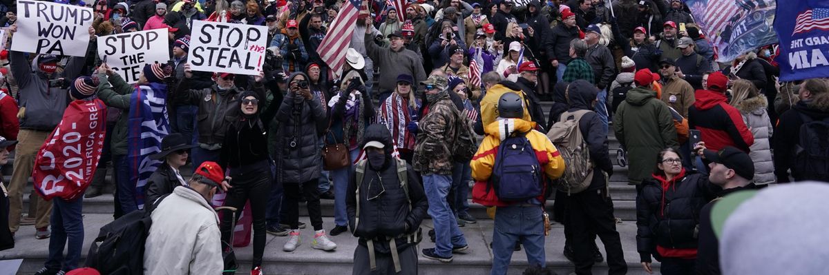 Right-wing insurrectionists, fueled by then-President Donald Trump's relentless lies about voter fraud, violently rioted at the U.S. Capitol in Washington, D.C., in an attempt to overturn the 2020 presidential election results before lawmakers finalized them in a joint session of the 117th Congress on January 6, 2021. (Photo: Kent Nishimura/Los Angeles Times via Getty Images)