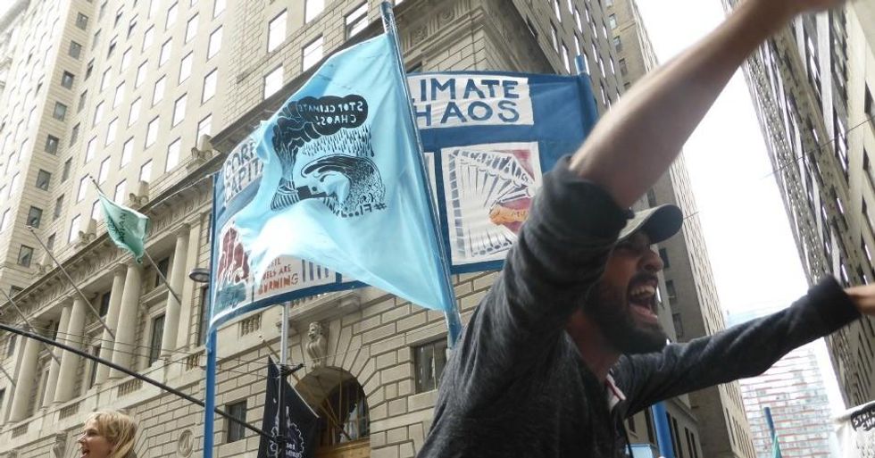 Rising Tide Seattle activist Madrone leads the crowd in a chant during Flood Wall Street on September 22, 2014. (Common Dreams: CC BY-SA 3.0 US)