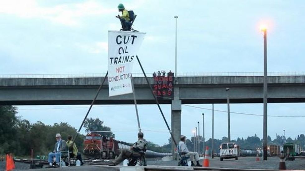 Rising Tide Seattle activists have blockaded an oil train in Everett. (Facebook / Rising Tide Seattle)