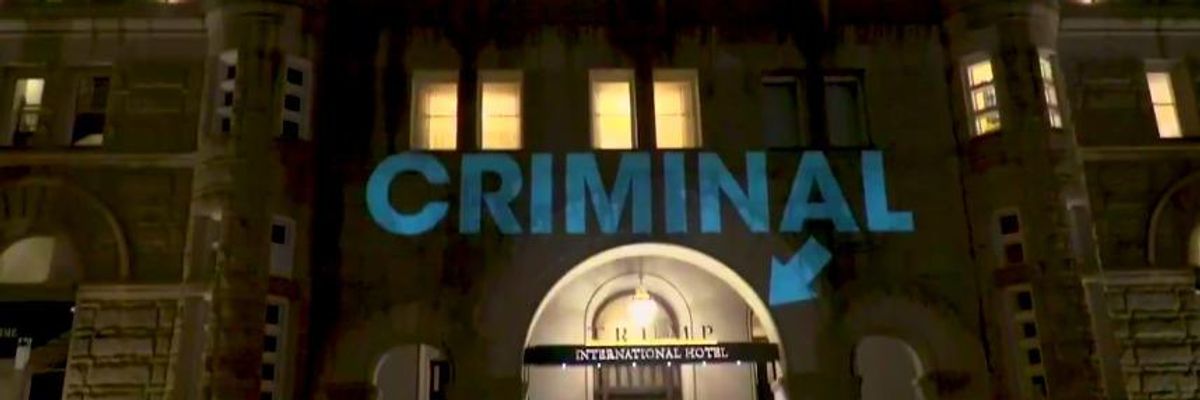 Words 'Guilty,' 'Criminal,' and 'Felons Welcome Here' Projected on Trump Hotel in DC