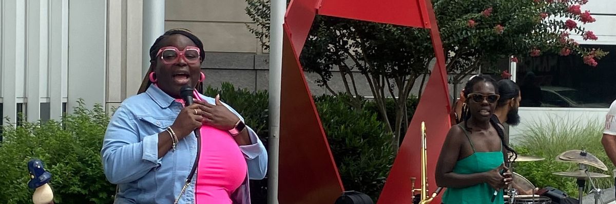 Roishetta Ozane outside FERC.