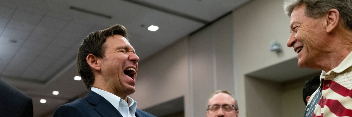 Ron DeSantis laughs at GOP attendee in Iowa.