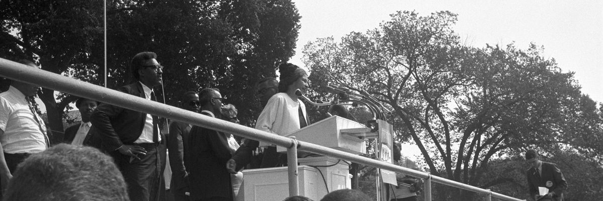 Rosa Parks says hello to a crowd at the March on Washington