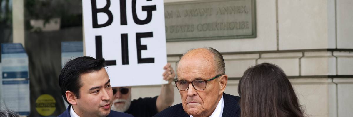 Rudy Giuliani talks to the press