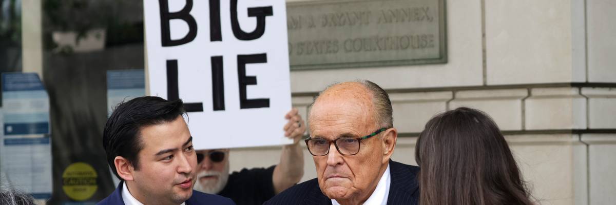 Rudy Giuliani talks to the press