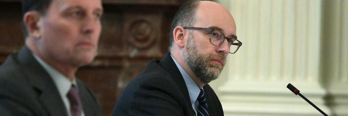 Russell Vought listens during a cabinet meeting in the East Room of the White House