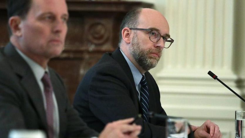 Russell Vought listens during a cabinet meeting in the East Room of the White House