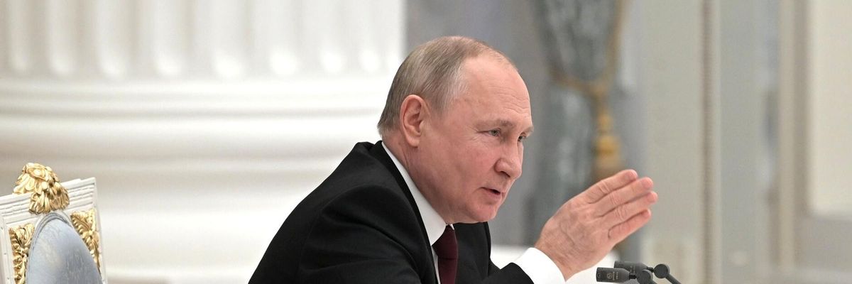 Russian President Vladimir Putin addresses the public