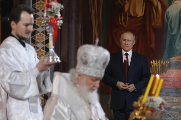 Russian President Vladimir Putin and Moscow Mayor Sergei Sobyanin attend an Orthodox Easter mass led by Russian Orthodox Patriarch Kirill