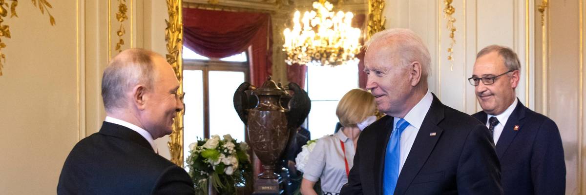 Russian President Vladimir Putin and U.S. President Joe Biden shake hands