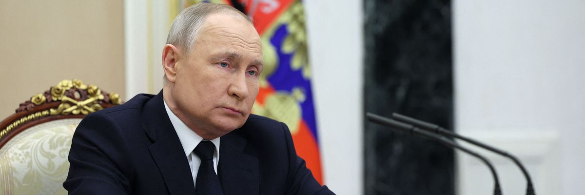 Russian President Vladimir Putin attends a meeting at the Kremlin in Moscow on March 25, 2023.