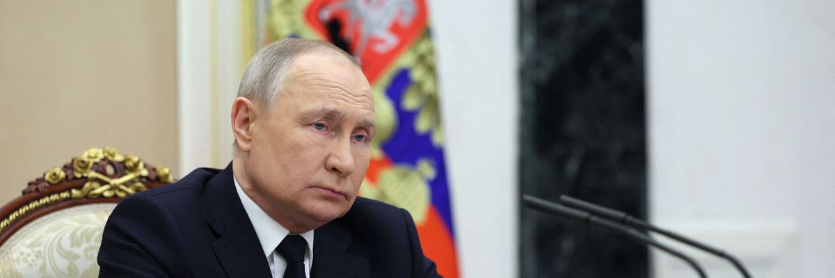 Russian President Vladimir Putin attends a meeting at the Kremlin in Moscow on March 25, 2023.