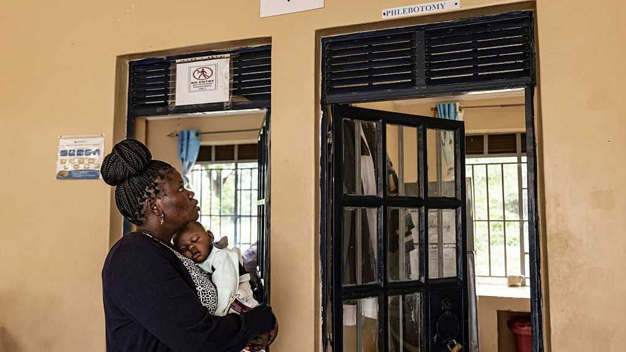 Ruth Gweyi, 34, a mother living with HIV since 2017 visits Kuoyo Sub-county Hospital with her child to collect their medications.