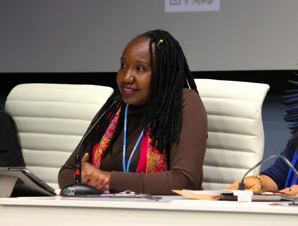 Ruth Nyambura discusses the intersection of gender, economy, and climate justice at a WECAN International U.N. side event at UNFCCC COP25 in Madrid, Spain. (Photo: Katherine Quaid/WECAN International)