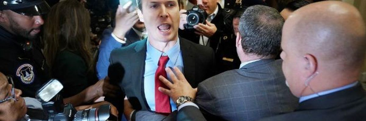 'Trump Is Treason': Man Throws Russian Flags at McConnell and President on Capitol Hill