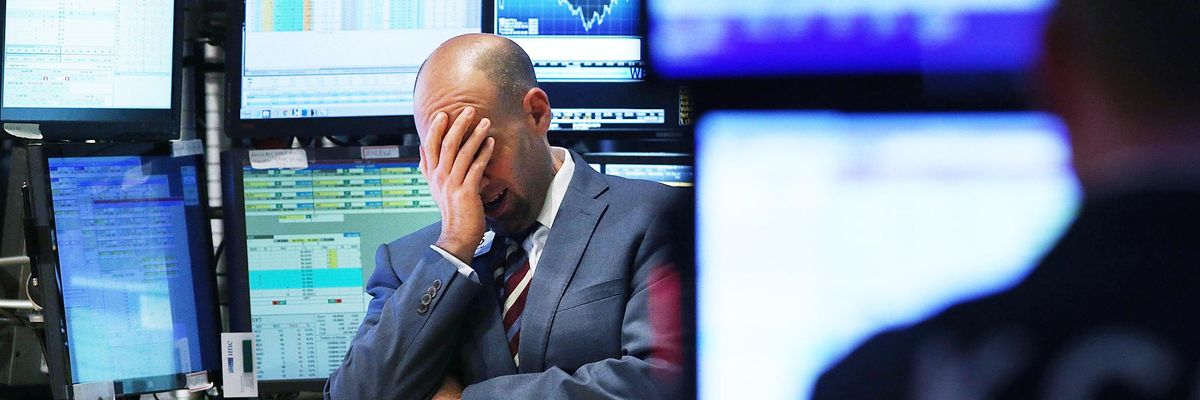 Sad trader on stock market floor