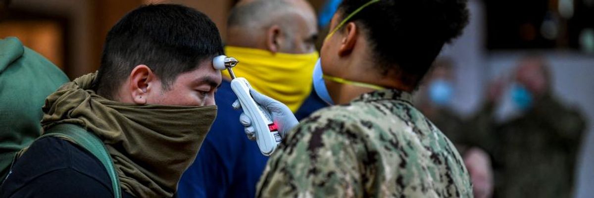 Pandemic in the Pacific: US Military Bases Are Hot Spots for More Than Just Covid-19--They Also Make Island Territories Targets for Climate Disasters