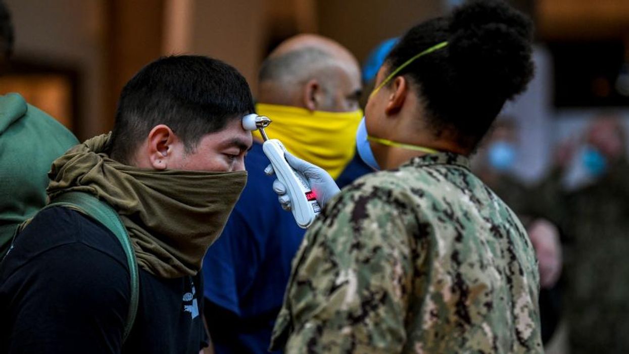 Pandemic in the Pacific: US Military Bases Are Hot Spots for More Than Just Covid-19--They Also Make Island Territories Targets for Climate Disasters