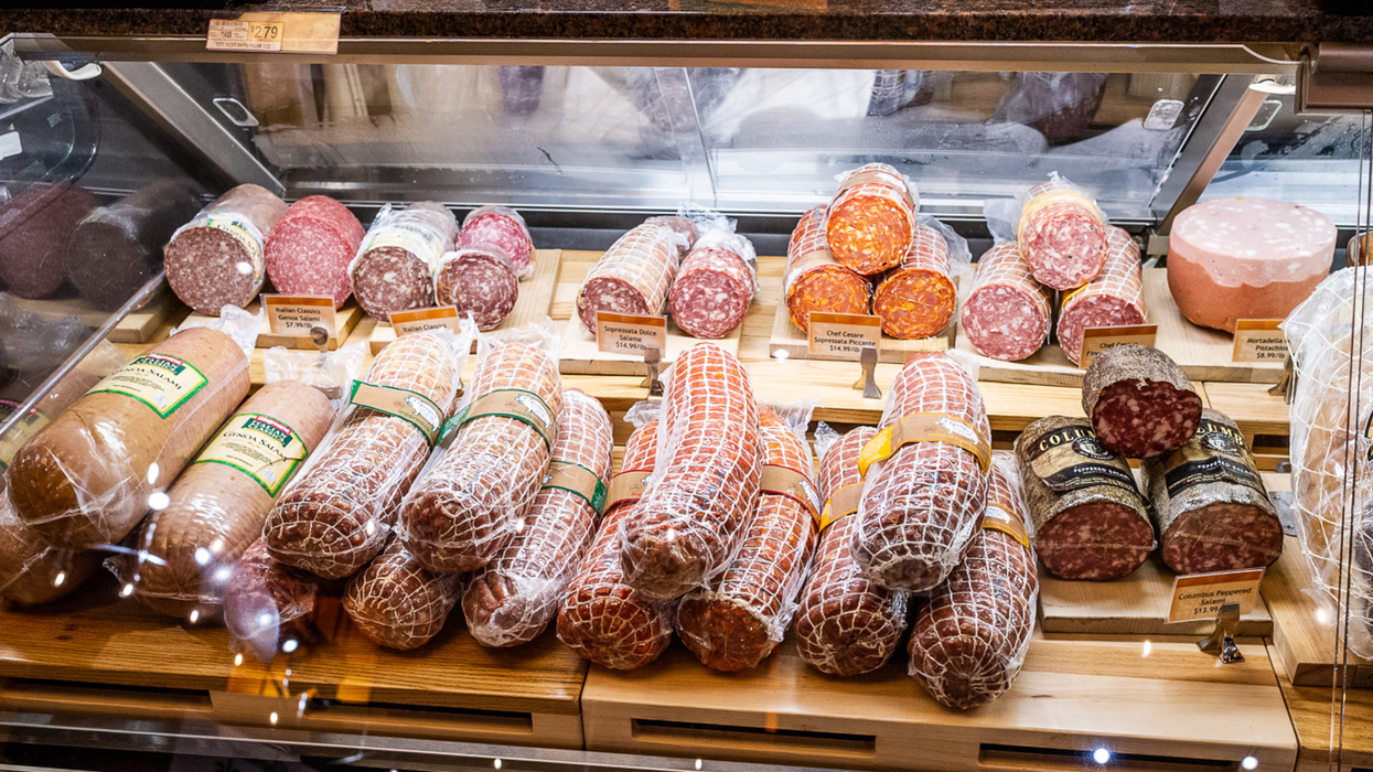 salumi and other deli meats behind a counter