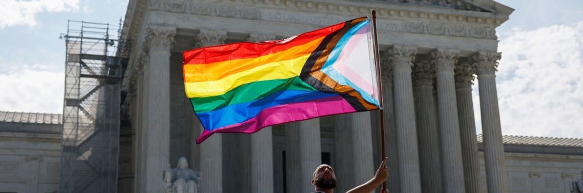 Same-sex marriage supporter in front of Supreme Court