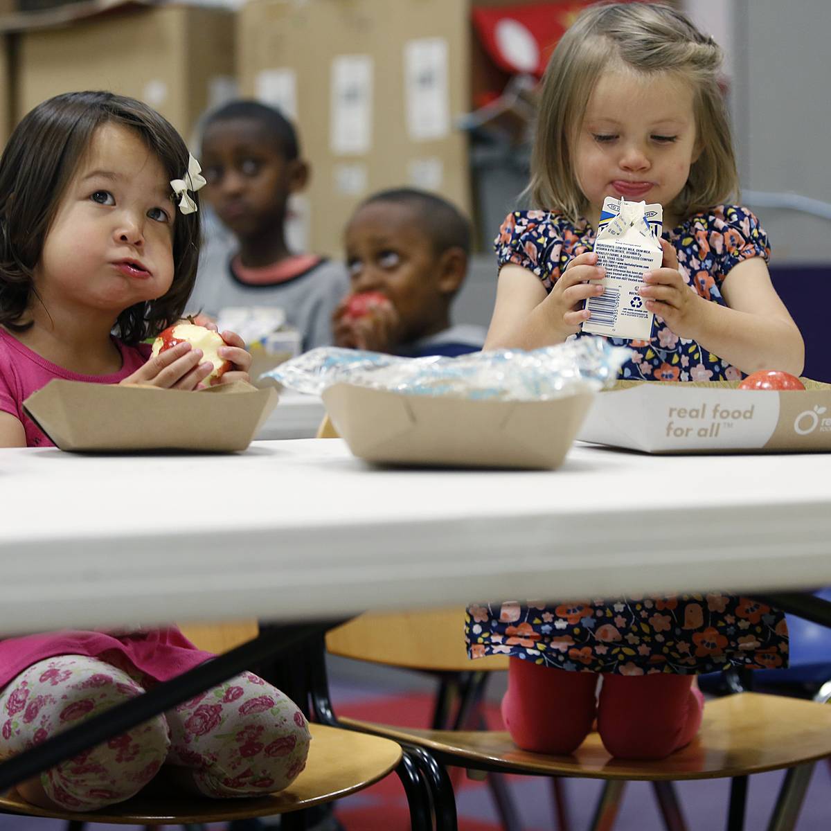 School children have lunch in a library in San Francisco, California