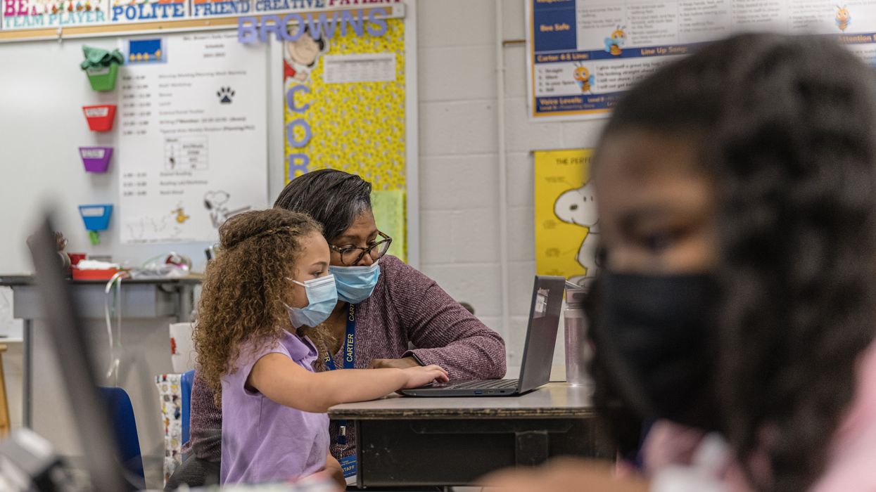 School teacher teaching student
