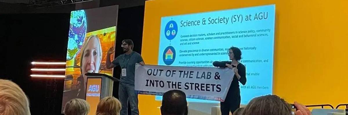 Scientists Peter Kalmus and Rose Abramoff took the stage for a brief protest