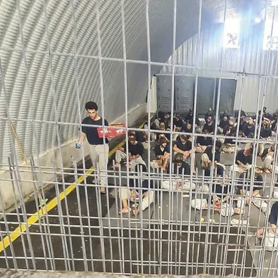 Sde Teiman prisoners sit shackled and blindfolded