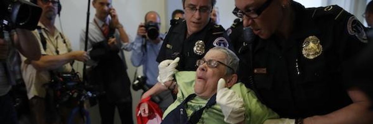 Disabled Activists Put Their Bodies on the Line to Defend Health Care