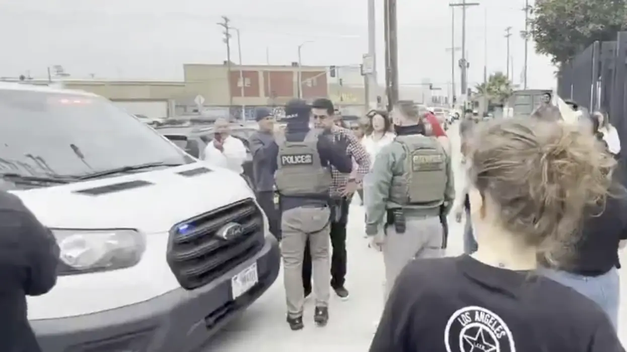 SEIU California president David Huerta being pushed