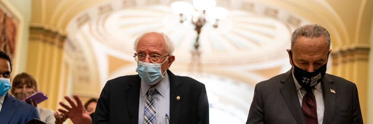 Sen. Bernie Sanders and Senate Majority Leader Chuck Schumer speak to the media