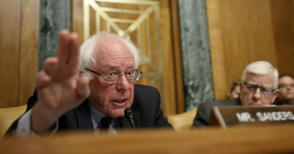 Sen. Bernie Sanders (I-Vt.) questions Office of Management and Budget Director Mick Mulvaney during a hearing held by the Senate Budget Committee February 13, 2018 in Washington, DC. Mulvaney testified on U.S. President Donald Trump's fiscal year 2019 budget proposal that was released yesterday. (Photo by Win McNamee/Getty Images)