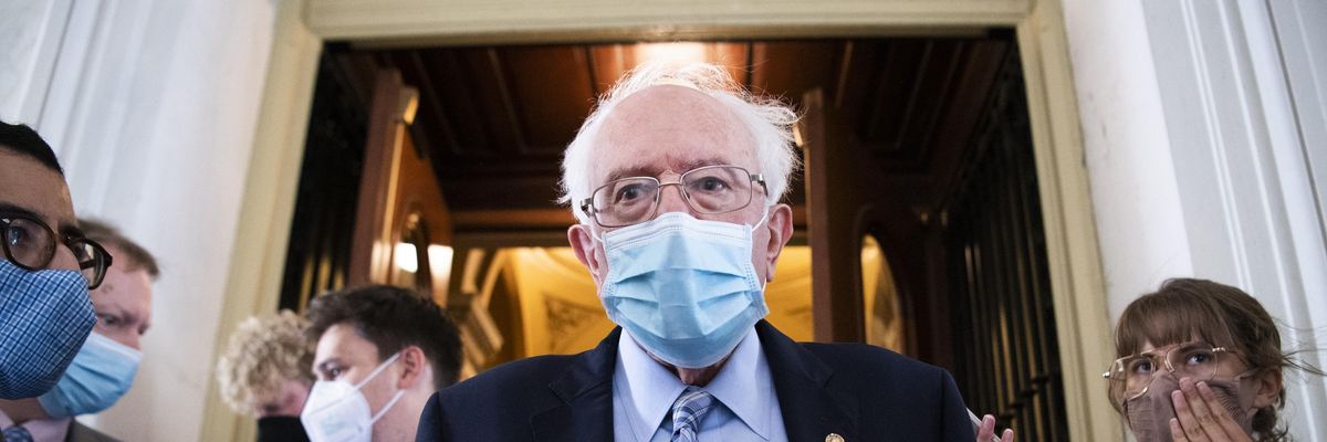 Sen. Bernie Sanders, I-Vt., talks with reporters while leaving the U.S. Capitol on Monday, August 9, 2021.