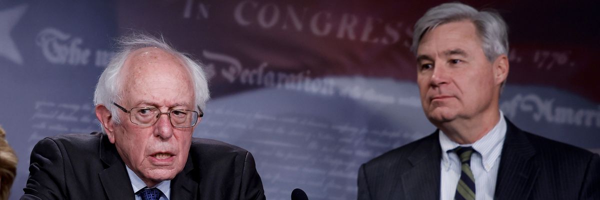Sen. Bernie Sanders speaks at a press conference alongside Sen. Sheldon Whitehouse