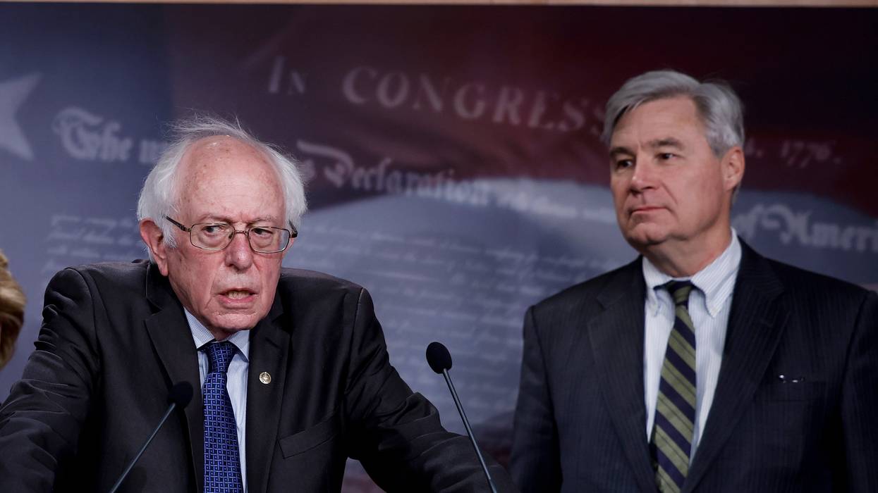 Sen. Bernie Sanders speaks at a press conference alongside Sen. Sheldon Whitehouse