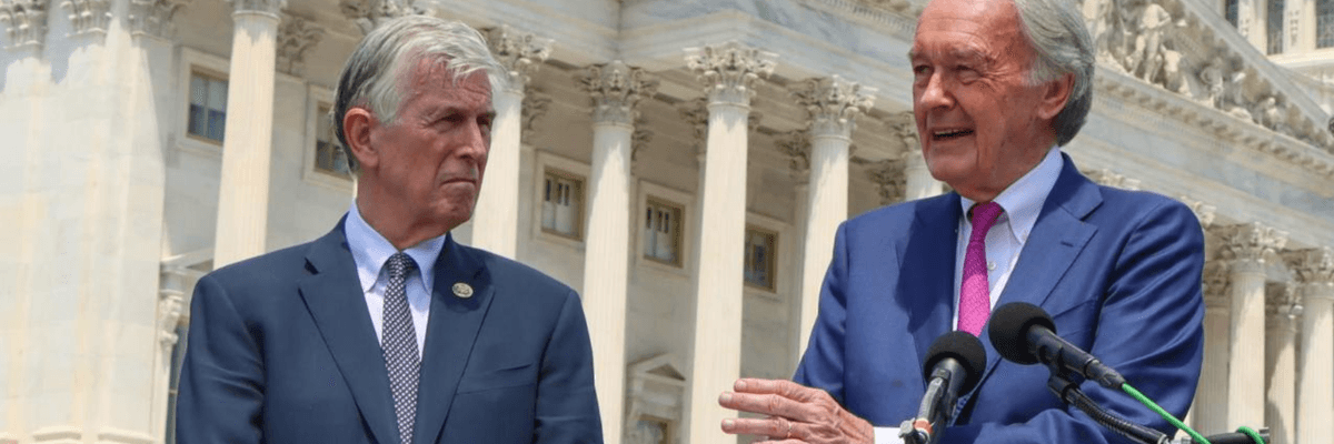 Sen. Ed Markey speaks while Rep. Don Beyer looks on, outside the U.S. Capitol