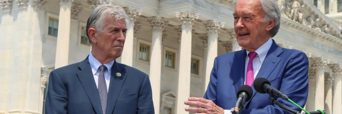 Sen. Ed Markey speaks while Rep. Don Beyer looks on, outside the U.S. Capitol