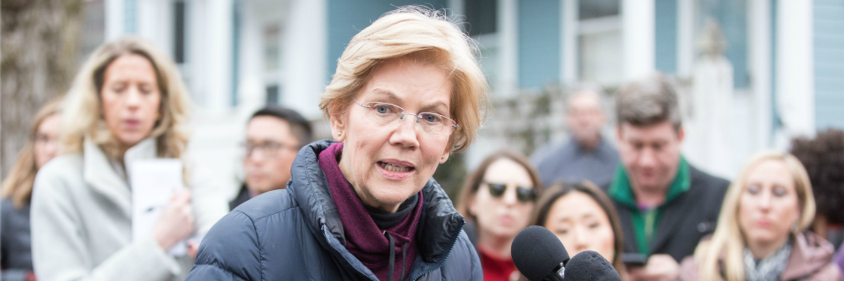 Slamming Joe Lieberman for Joining Chinese Telecom Giant, Warren Calls for 'Lifetime Ban' on Members of Congress Becoming Lobbyists