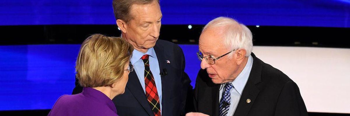 Sen. Elizabeth Warren (D-Mass.) chats with Sen. Bernie Sanders (I-Vt.) alongside billionaire-philanthropist Tom Steyer