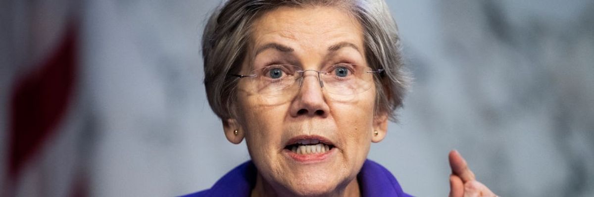 Sen. Elizabeth Warren (D-Mass.) questions Federal Reserve Chair Jerome Powell at a hearing on March 7, 2023.