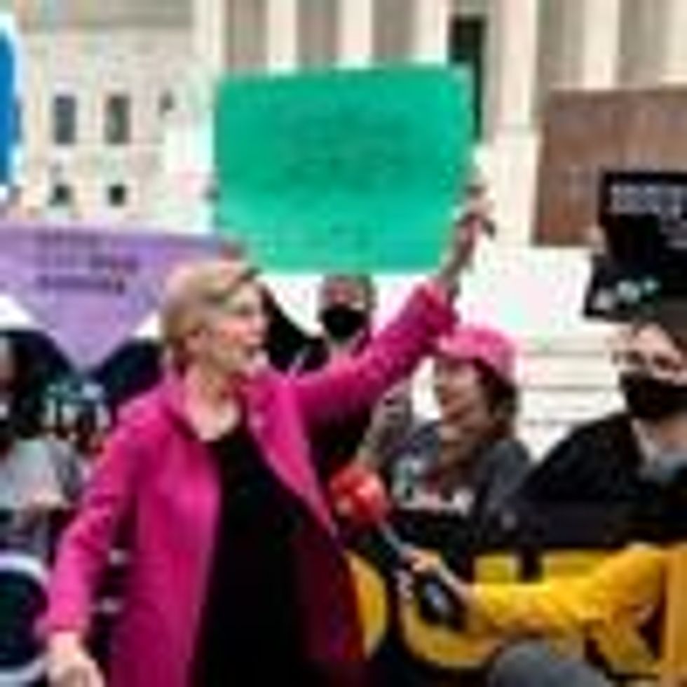 Sen. Elizabeth Warren speaks outside the U.S. Supreme Court building