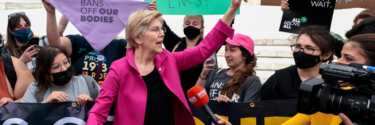 Sen. Elizabeth Warren speaks outside the U.S. Supreme Court building