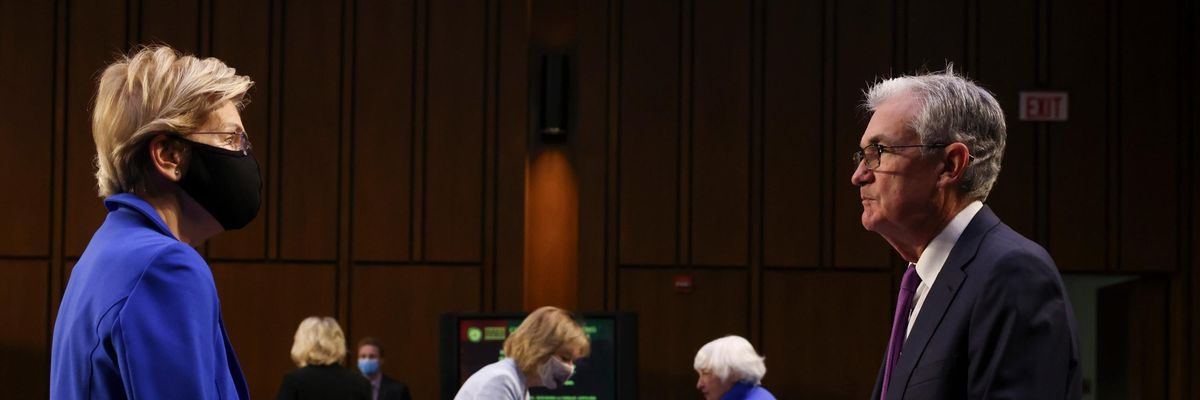Sen. Elizabeth Warren speaks to Fed Chair Jerome Powell