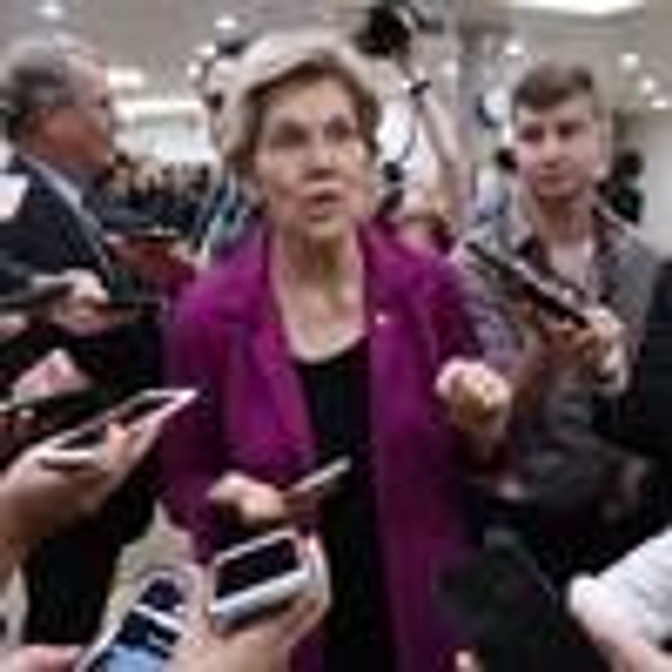 Sen. Elizabeth Warren speaks to reporters