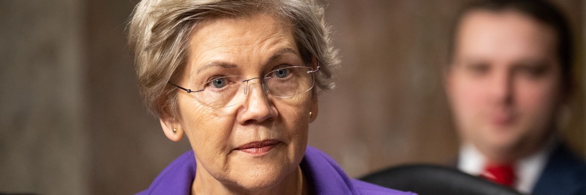 Sen. Elizabeth Warren takes her seat during a hearing