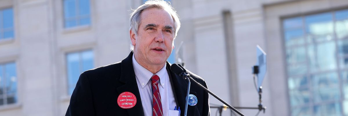 Sen. Jeff Merkley at a podium.