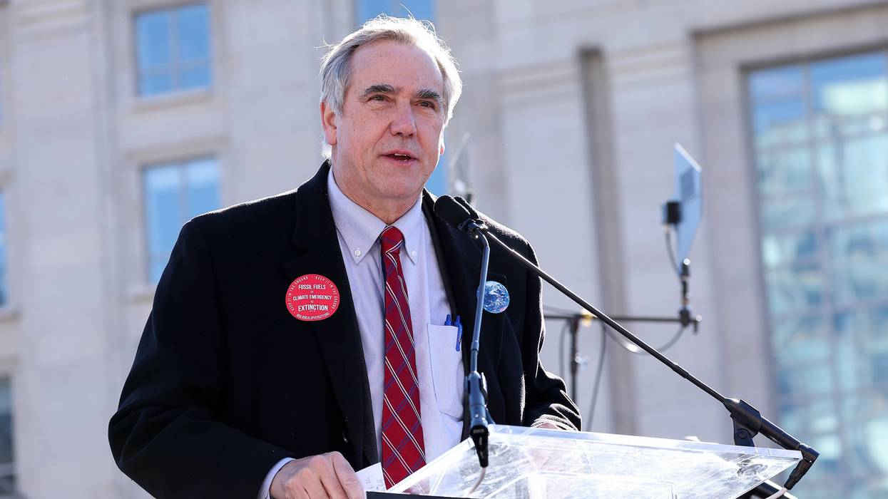 Sen. Jeff Merkley at a podium.
