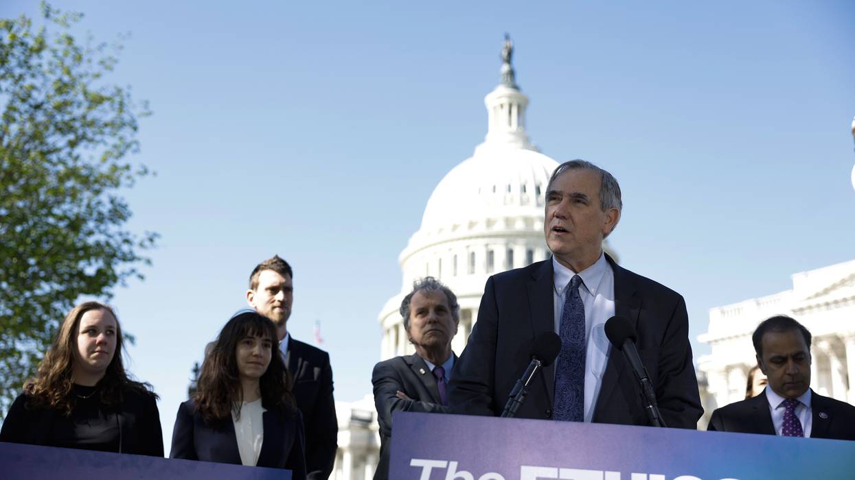 Sen. Jeff Merkley speaks at a press conference on the introduction of the ETHICS Act