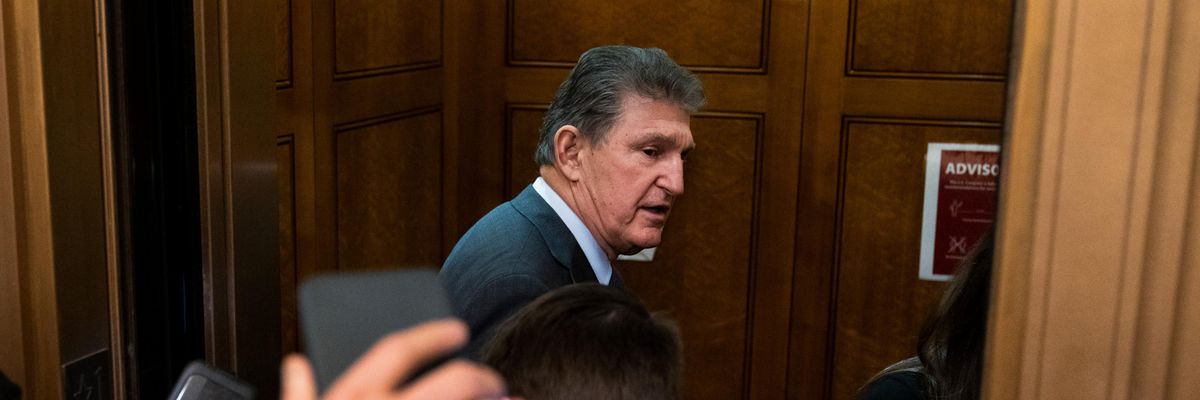 Sen. Joe Manchin enters an elevator
