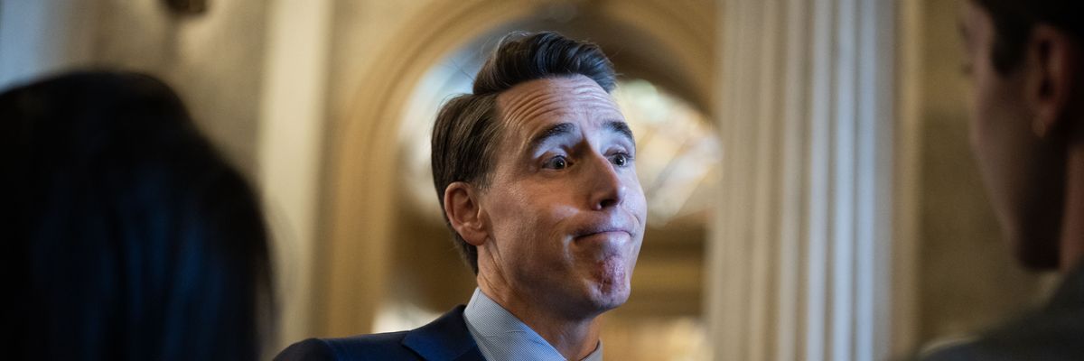 Sen. Josh Hawley talks with reporters